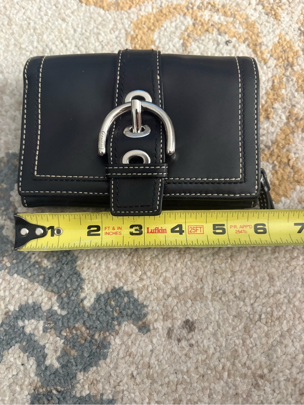 Coach Black Leather Women's Wallet with Contrast Stitching and Silver Buckle